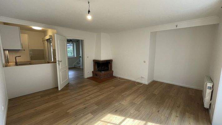 Wohnzimmer mit Kamin