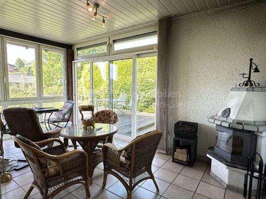 Wintergarten mit Kamin