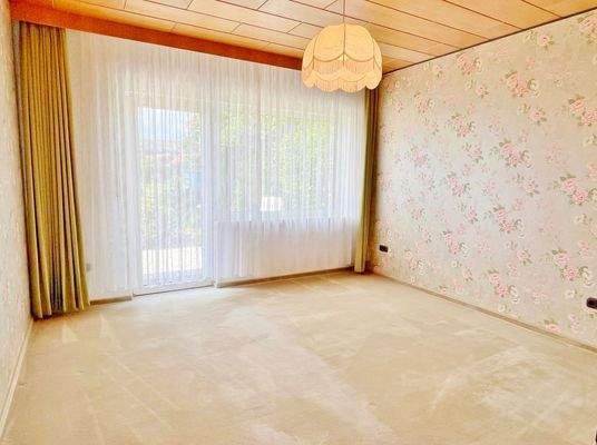 Einliegerwohnung: Schlafzimmer mit Terrassenzugang