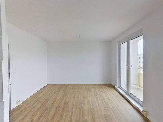 Ansicht V: Wohn- und Esszimmer mit offenem Küchenbereich