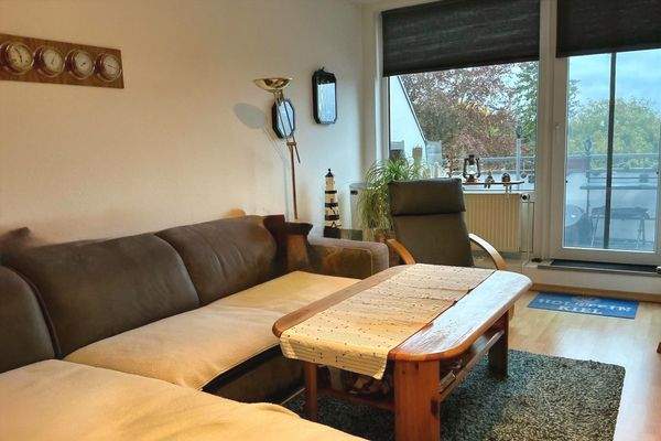 WE 3. OG 3.4 Wohnzimmer mit Balkon