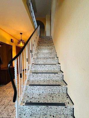 Treppenaufgang ins Obergeschoss