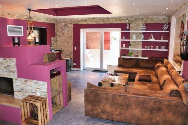 Wohnzimmer und Zugang zur Terrasse