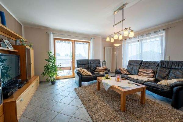 Wohnzimmer mit Kaminofen EG Whg. 1