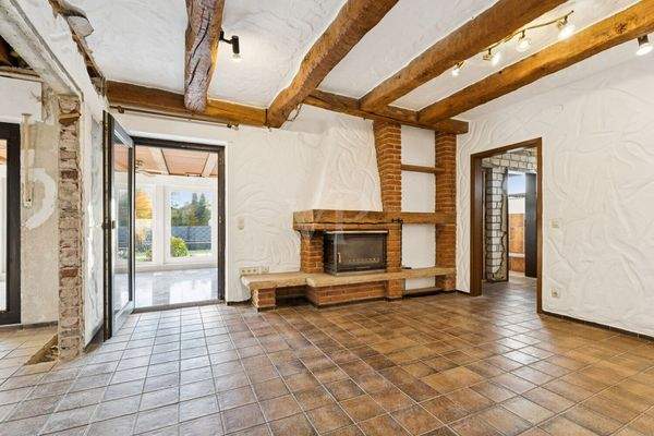 Kaminzimmer mit Zugang zum Wintergarten/ WE 1