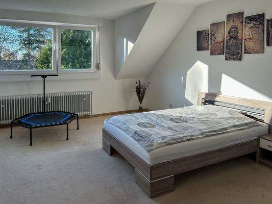 Schlafzimmer mit Blick ins Grüne