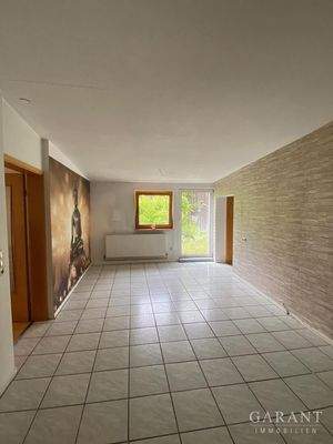 Wohnzimmer mit Ausgang zum Garten