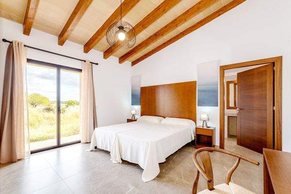 Schlafzimmer mit Badezimmer en Suite