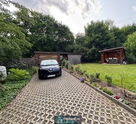 Garage und Überdachte Terrasse