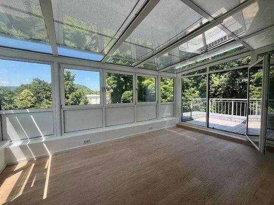 Wintergarten mit elekrischer Beschattung