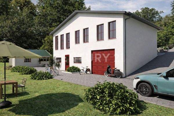 Die zukünftige Rückansicht mit Auffahrt