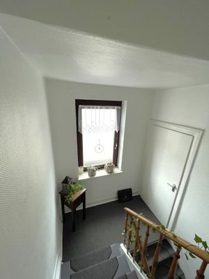 Treppenabgang vom Dachgeschoss mit Abstellkammer