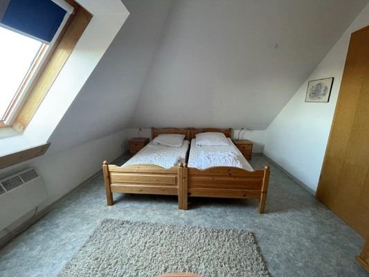 Schlafzimmer Spitzboden