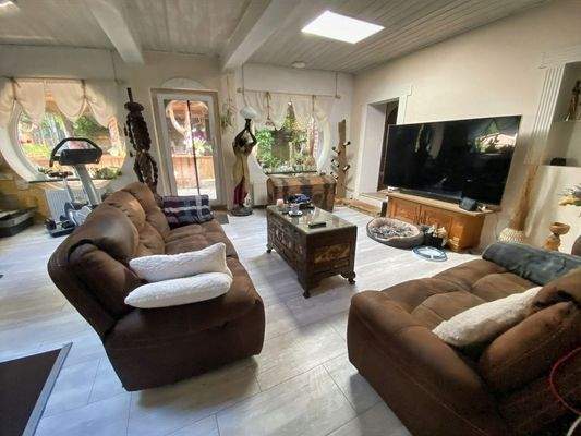 Wohnzimmer mit Terrassenausgang