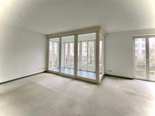 Wohnzimmer mit Wintergarten