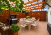 Terrasse_ mittels KI möbliert