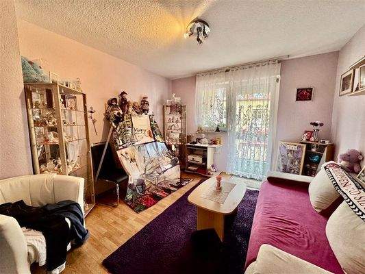 Kinderzimmer und Balkonzugang