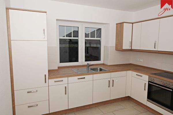 Küche mit Einbauküche