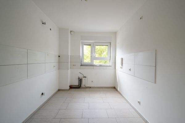 Küche mit schönen hellen Fliesen