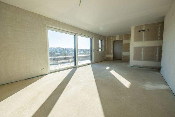 Wohn-Esszimmer-mit Zugang zur Dachterrasse