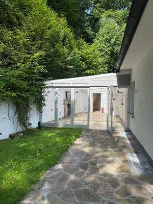 Wintergarten Eingang vom Garten