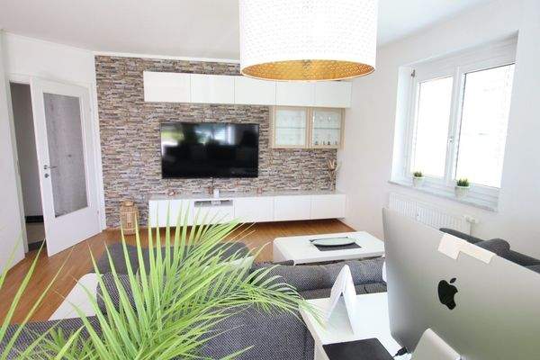 Traumhafte, neuwertige 3 Zi Gartenwohnung mit 400m² Eigengarten in Waidmannsdorf mit Tiefgarage