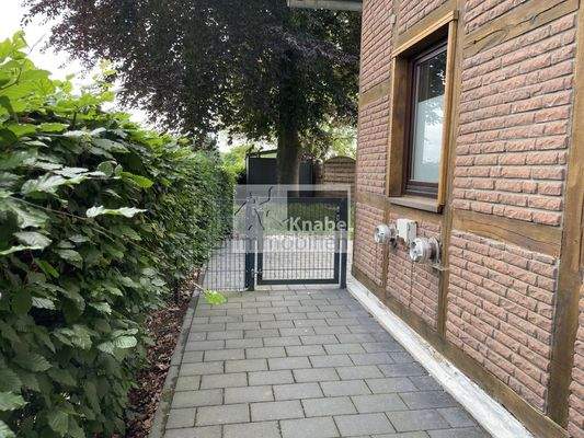 Zugang zur Wohneinheit mit Terrasse