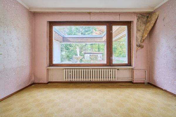 Schlafzimmer mit Blick in den Garten