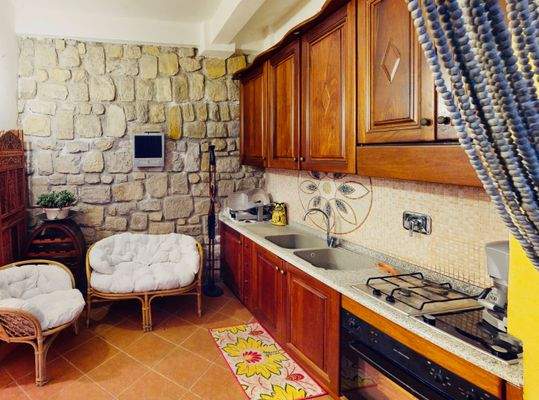 appartamento-in-vendita-Sanremo-lusso-garage-doppio-giardino-cucina-all'aperto
