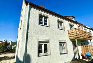 Ihr Haus mit Ihrem Balkon vom Garten