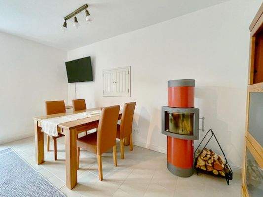 Essgruppe und Kachelofen