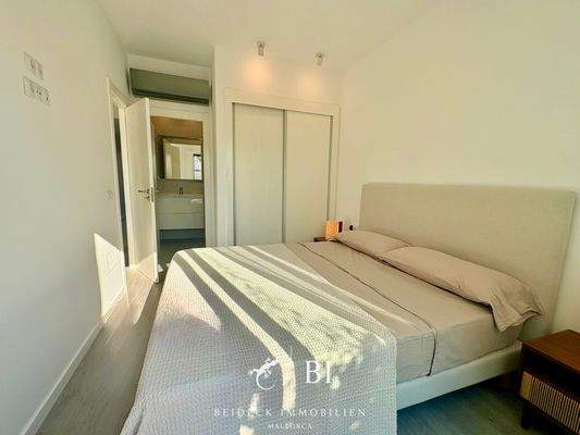 Schlafzimmer mit Bad en suite