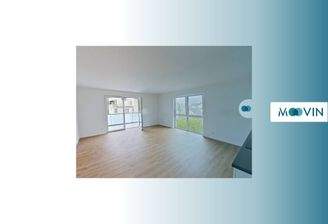 Ansicht I: Wohn- und Esszimmer mit offenem Küchenbereich