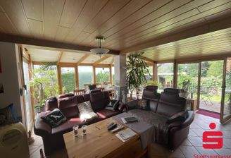 Wohnzimmer mit Wintergarten