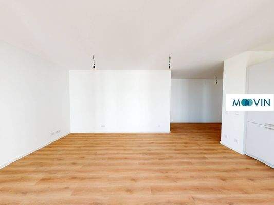 Ansicht V: Wohn- und Esszimmer mit offenem Küchenbereich