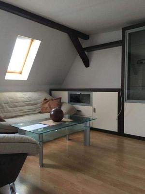 Whg. 6 Wohnzimmer im Dachboden.JPG