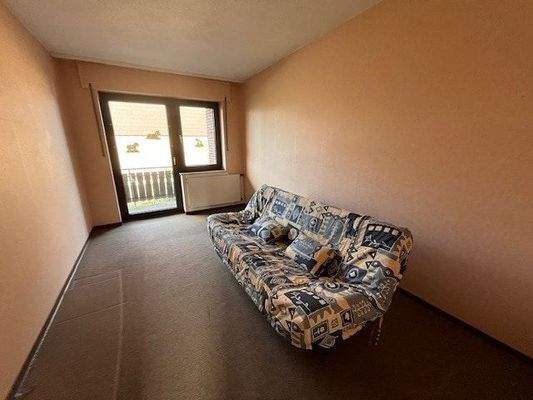 OG - 1. Zimmer mit Ausgang auf den Balkon