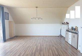 Wohnzimmer mit Essbereich - Wohnung DG 