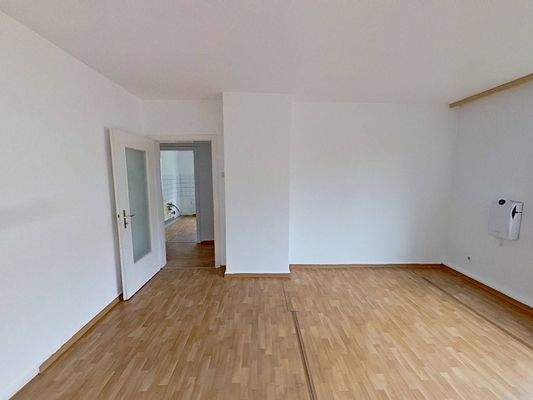 Ansicht II. Wohn- und Esszimmer