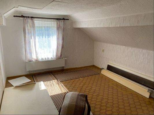 Zimmer im Obergeschoß