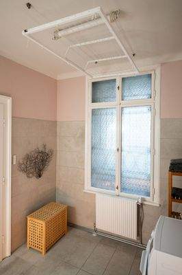 bathroom with laundry lift