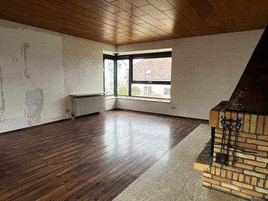 Wohnzimmer in der Hauptwohnung