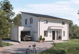 Modernes massa haus Fertighaus Einfamilienhaus im Lifestyle-Design mit markantem Pultdach und einer