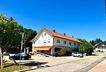Wohn- und Geschäftshaus – Straßenansicht mit Dorfladen