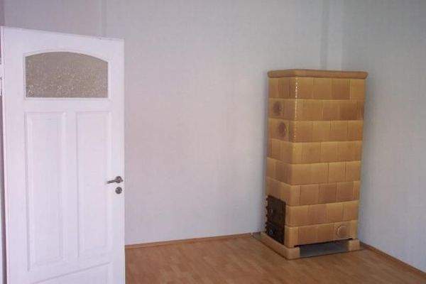 Kachelofen im Schlafzimmer