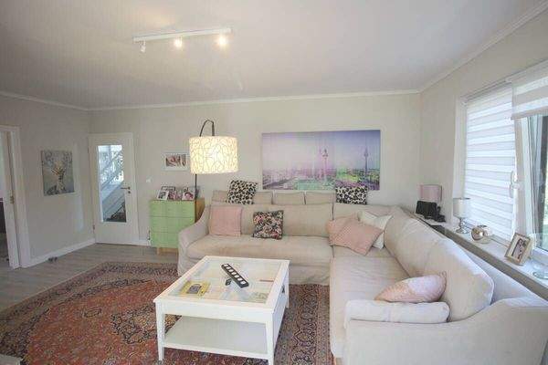 Herzstück Wohnzimmer EG als Dreh- und Angelpunkt