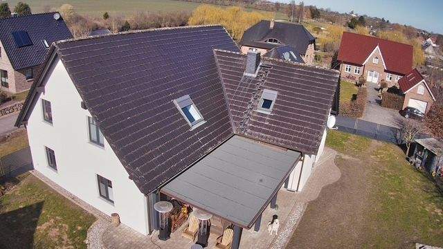 Rückseite mit Veranda.JPG