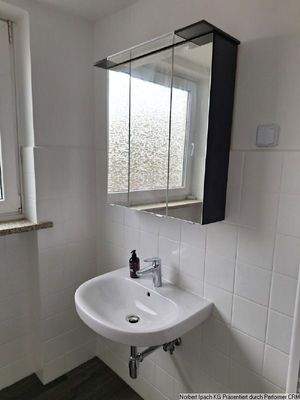 Spiegelschrank im Bad