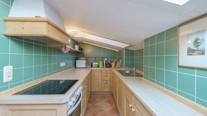 KITZIMMO-Gemütliche Dachgeschosswohnung in Toplage mieten - Immobilien Reith.