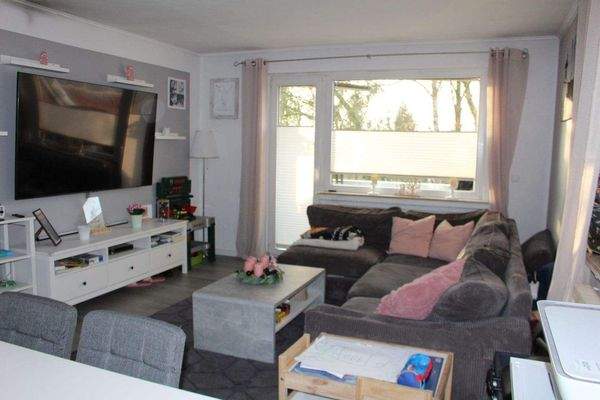 Wohnzimmer mit Balkon